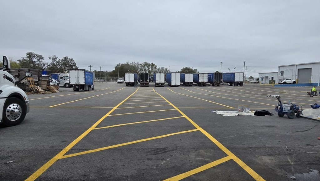 yellow line striping freshly painted for LV Thompson parking lot