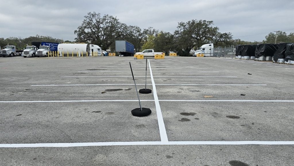 white parking spots freshly painted for LV Thompson parking lot