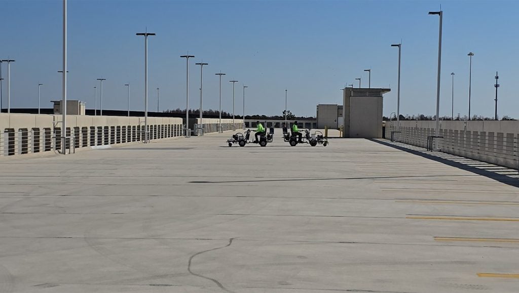 G-FORCE® employees line striping USAA parking garage