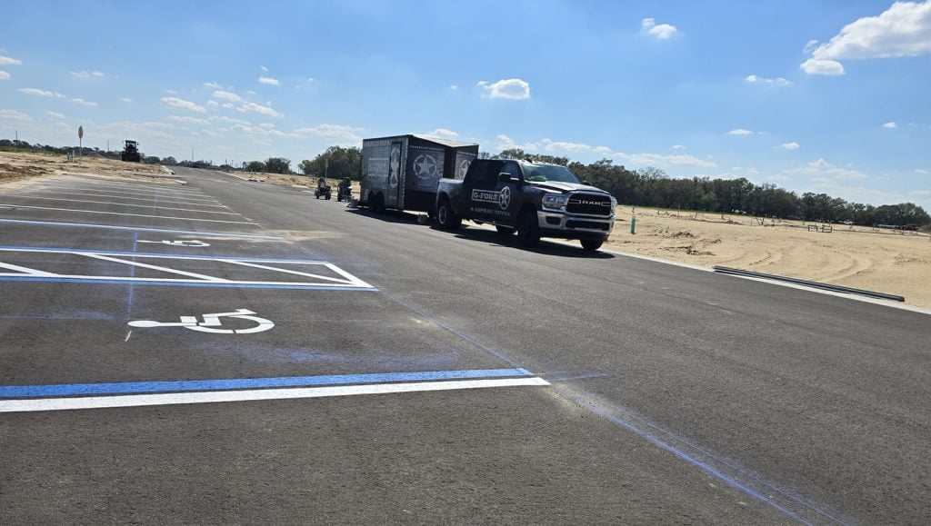 close-up of ada compliance parking spots freshly painted for new development