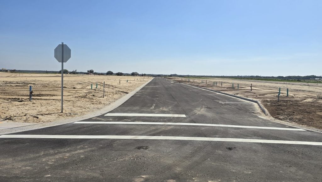 white line markings freshly painted for new development parking lot