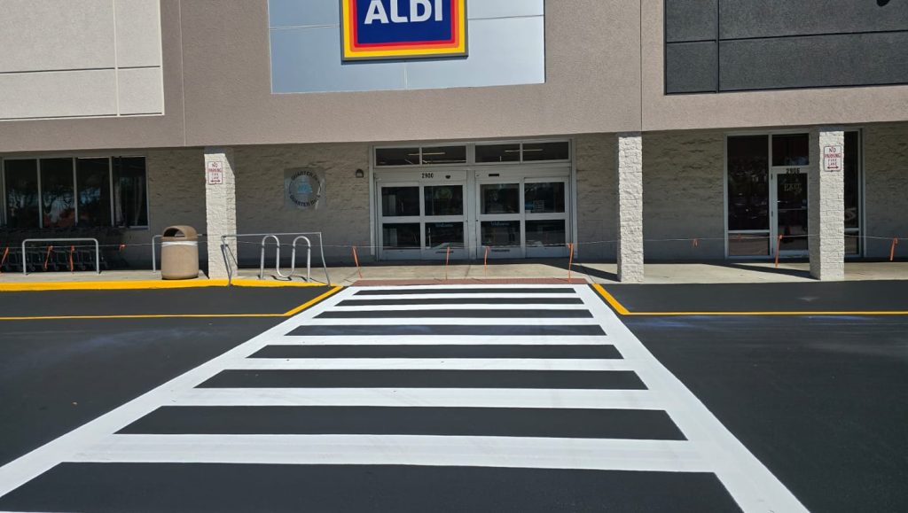 crosswalk freshly painted for Aldi's parking lot