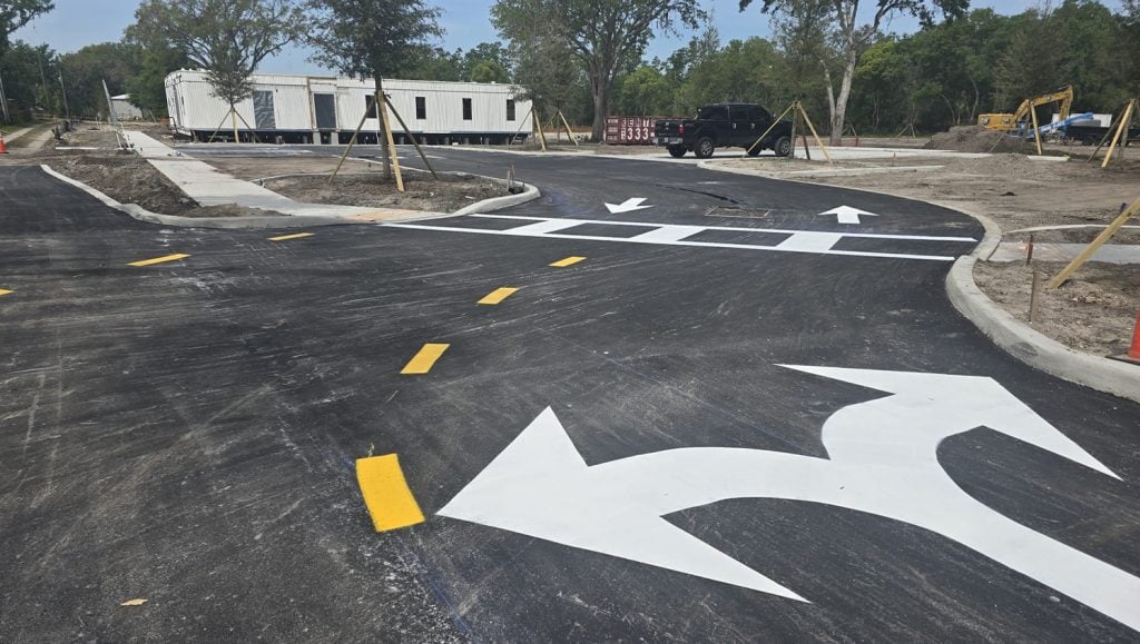 close-up of freshly painted line markings for business parking lot