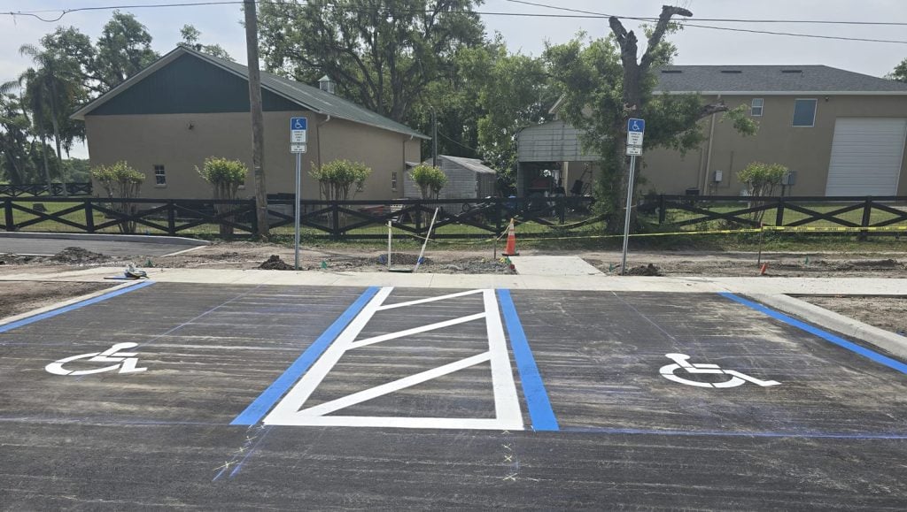ada compliance parking spots freshly painted for business parking lot