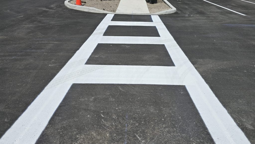 close-up of freshly painted cross walk for Home 2 Suites
