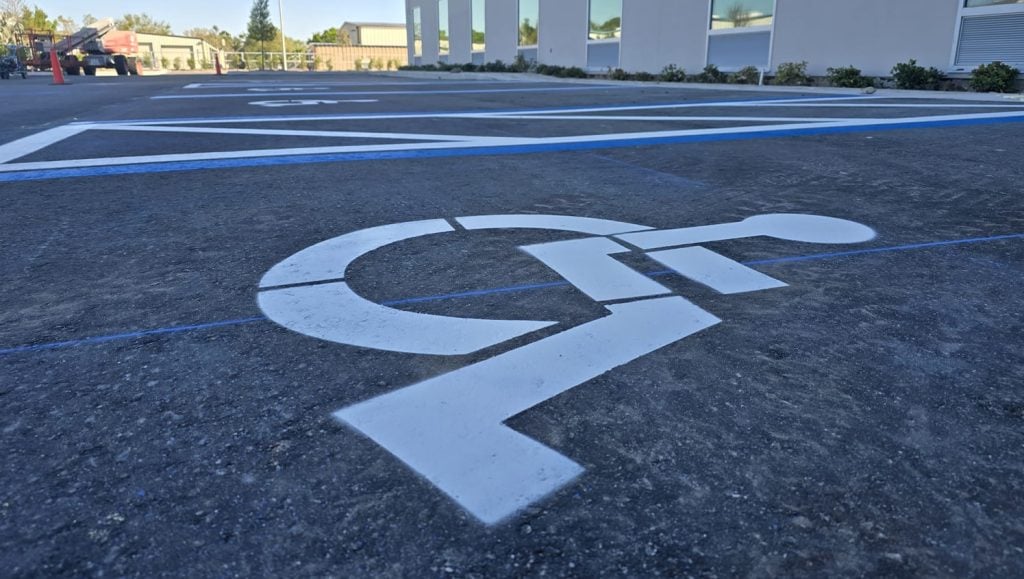 ada compliance parking spot freshly painted close-up for Home 2 Suites