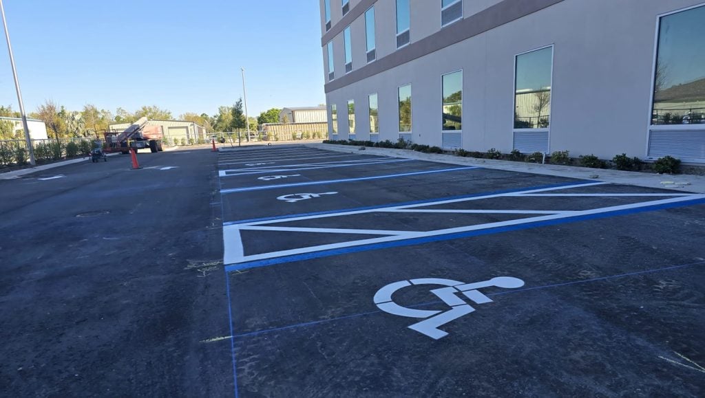 freshly painted parking spots for Home 2 Suites parking lot