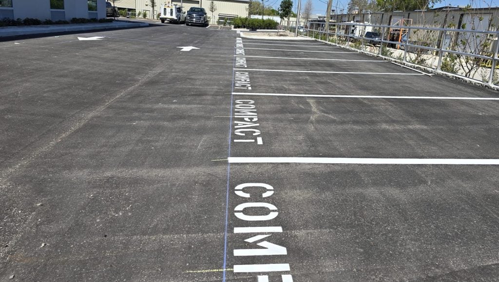 compacted parking spots freshly painted for Home 2 Suites