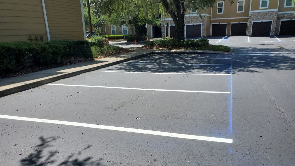 parking spots freshly painted for apartment complex