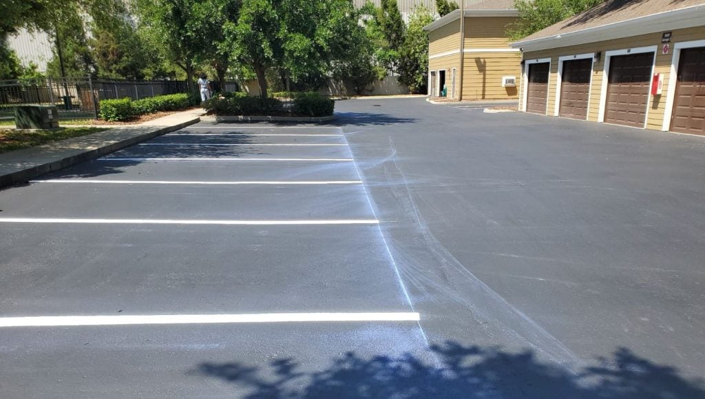 close-up of freshly painted line markings for apartment complex