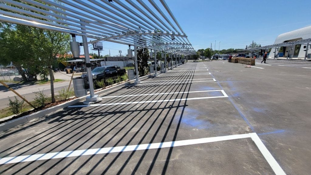 parking spots freshly painted for Aguasonic Car Wash parking lot