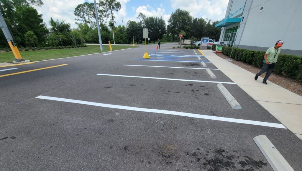 parking spots freshly painted for U-Haul parking lot