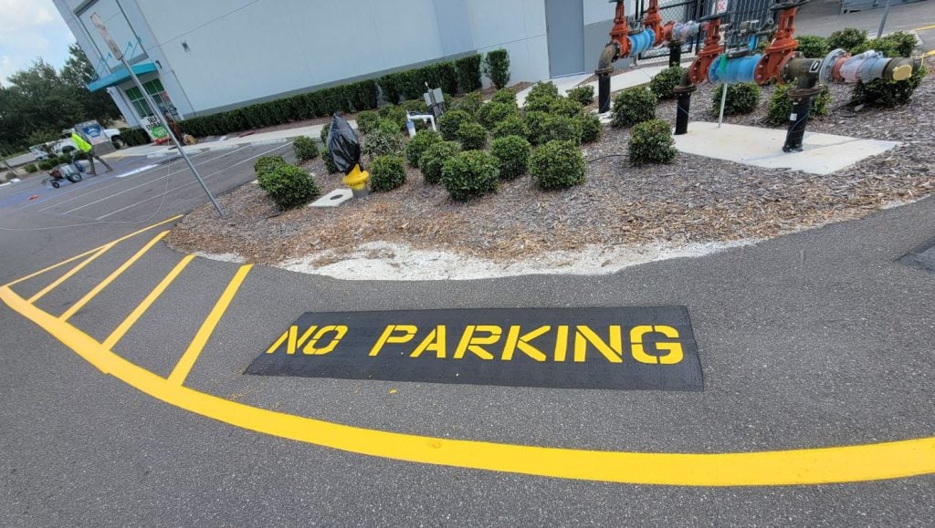 no parking freshly painted for U-Haul parking lot