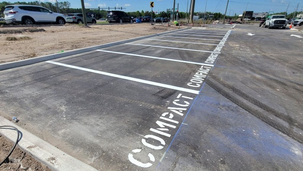 parking spots freshly painted for Ashley Furniture parking lot