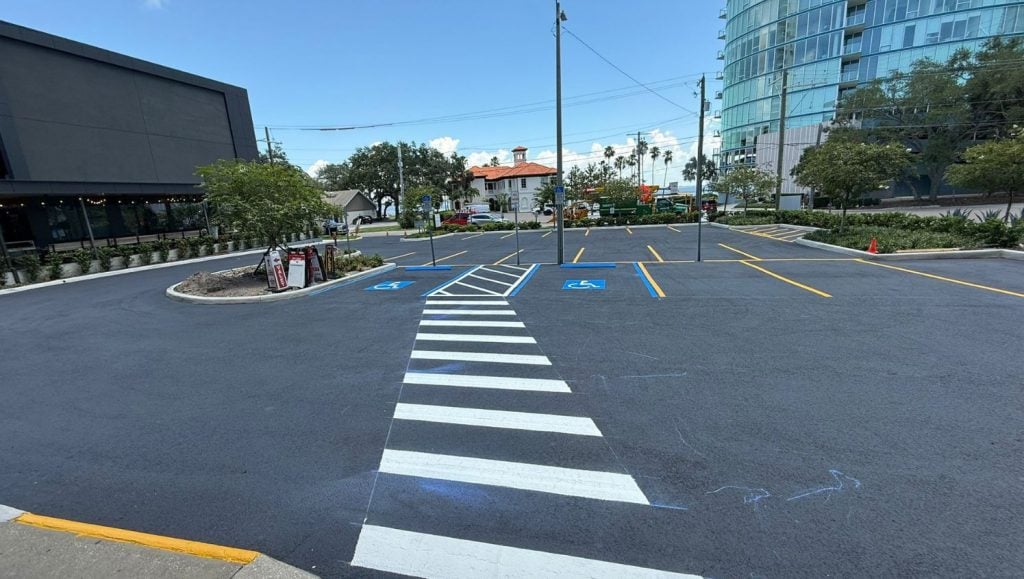 crosswalk freshly painted for Bay to Bay parking lot close-up