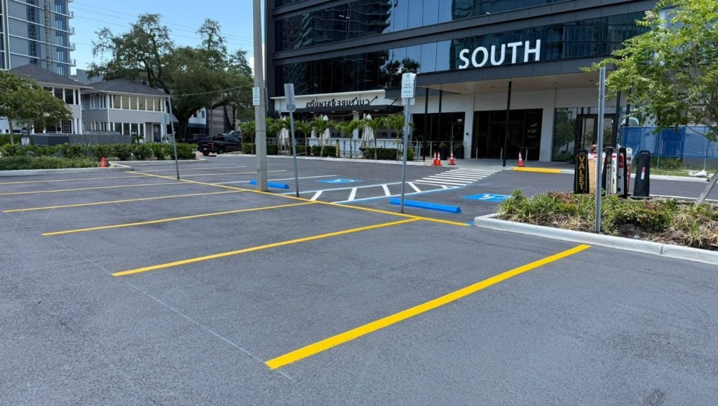 ada compliance parking spots freshly painted for Bay to Bay parking lot