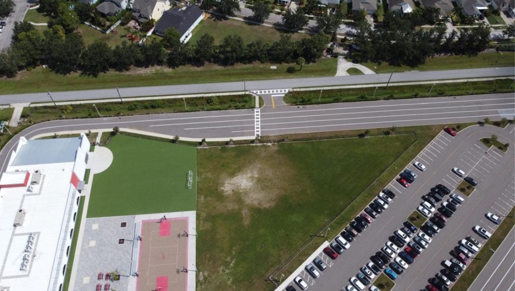 aerial view of SLAM parking lot with freshly painted parking spots