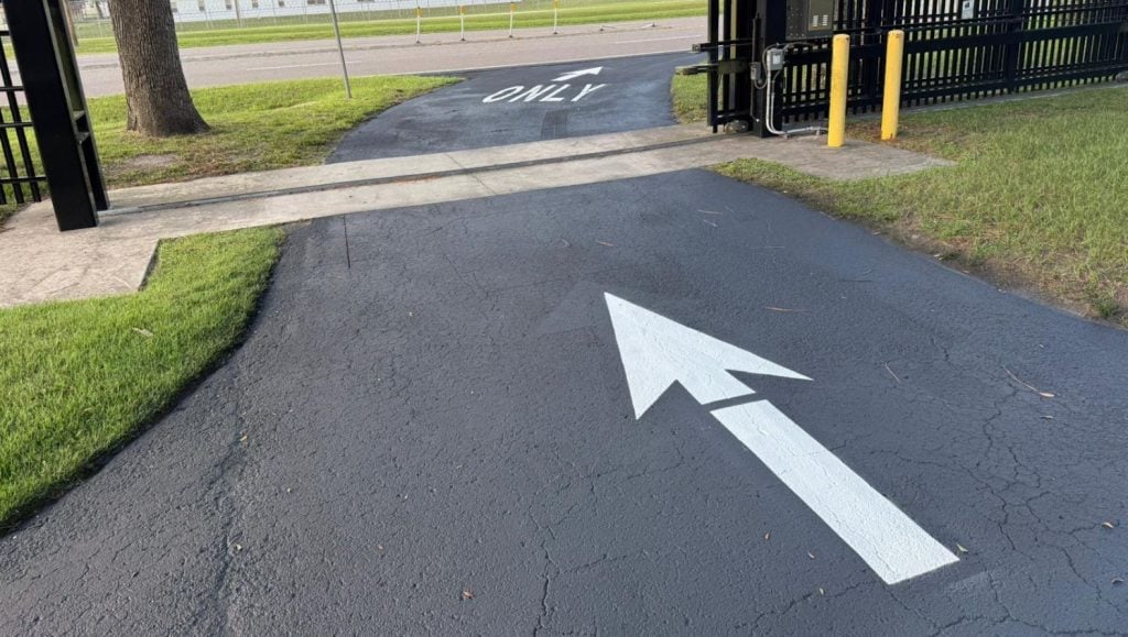freshly painted arrows for National Guard Armory parking lot