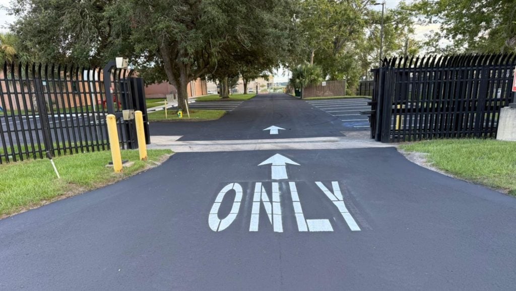 "only" painted on National Guard Armory parking lot