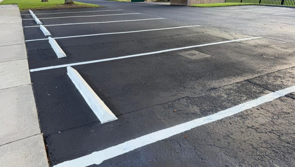 freshly painted line markings for National Guard Armory parking lot
