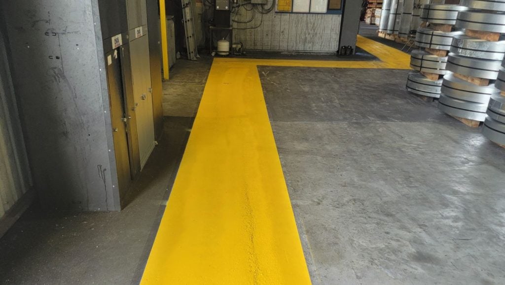 yellow line markings freshly painted for warehouse in tampa