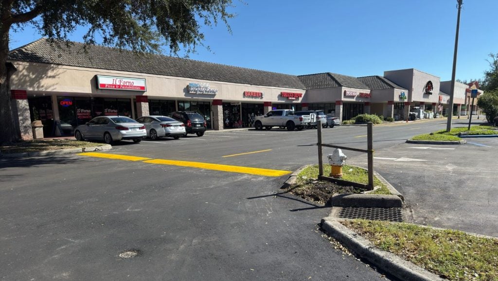 yellow line striping freshly painted for shopping center
