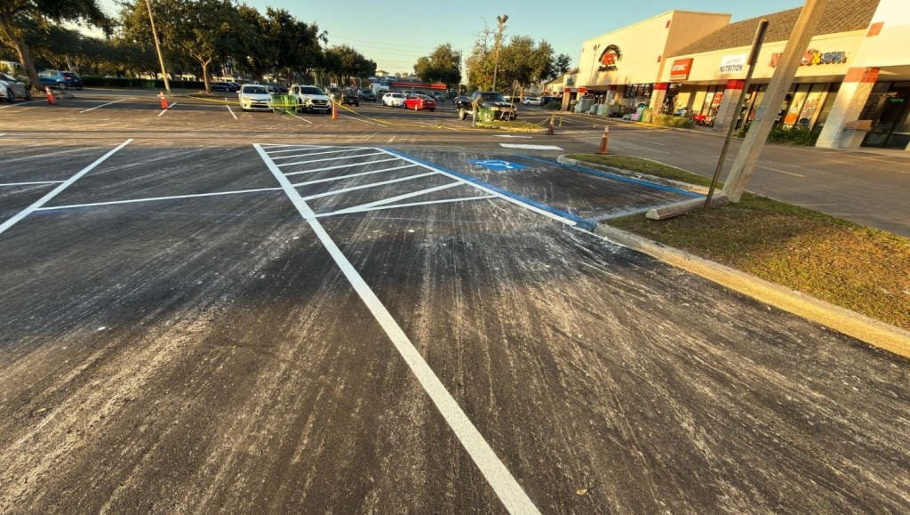 close-up of line markings for shopping center freshly painted