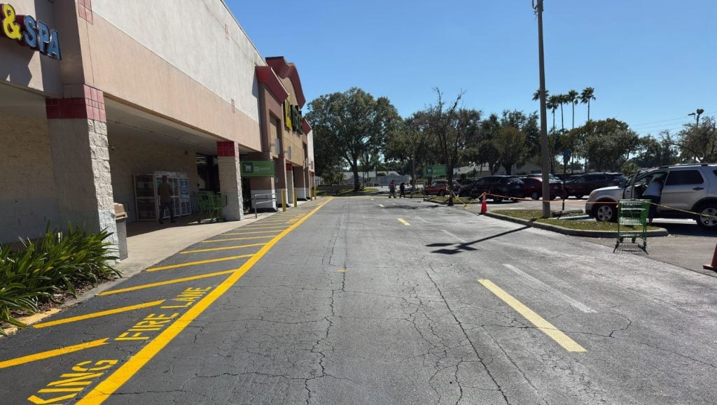 yellow line markings for shopping center freshly painted
