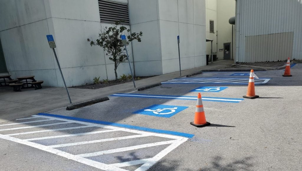 ada compliance parking spots freshly painted for business parking lot