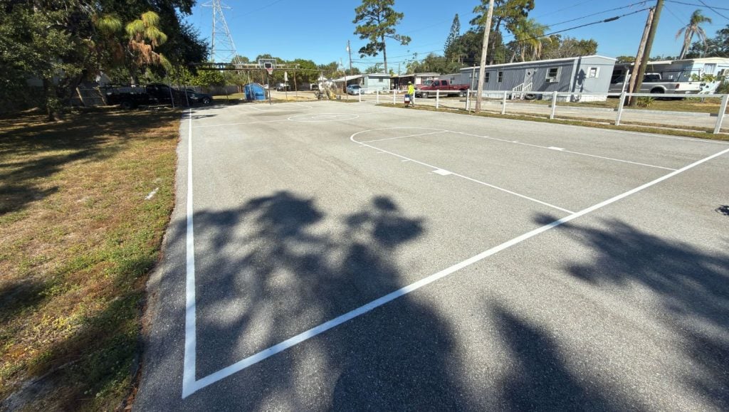 close-up of basketball court freshly painted for a community