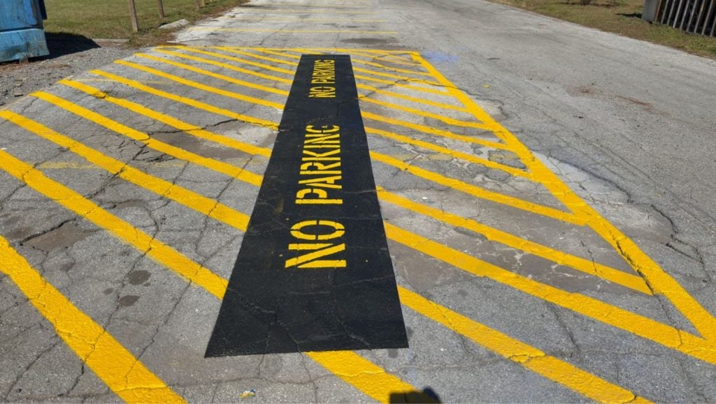 no parking freshly painted for community