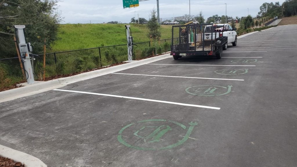 ev charging bay markings freshly painted for business parking lot