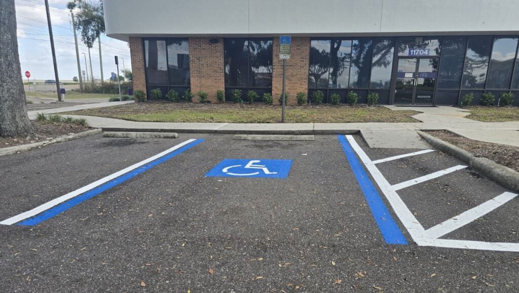ada compliance parking spot freshly painted for Truist Bank parking lot