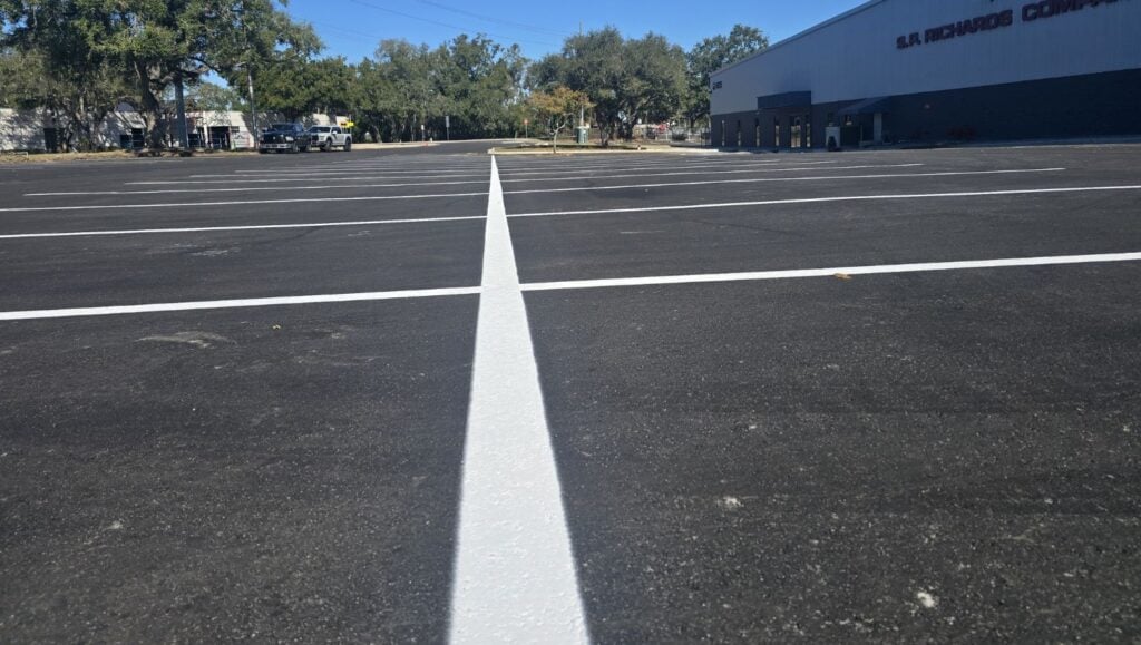 warehouse parking lot with freshly painted parking spots