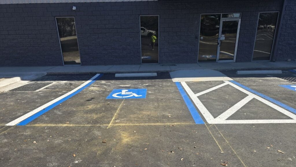 ada compliance parking spots freshly painted for warehouse parking lot