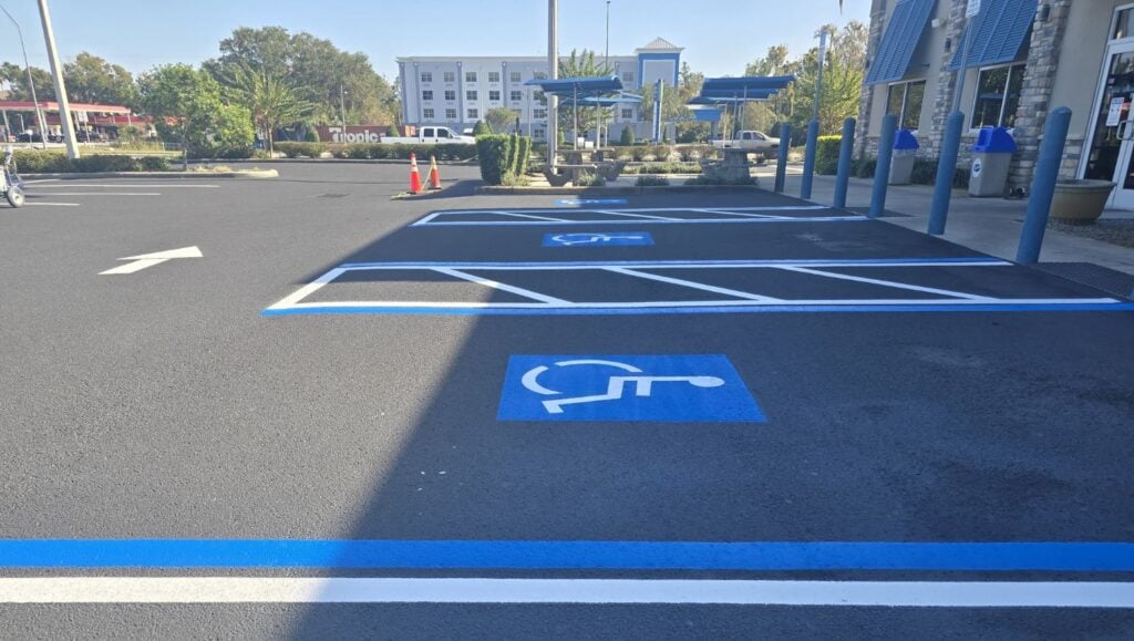 close-up of ada compliance parking spots freshly painted
