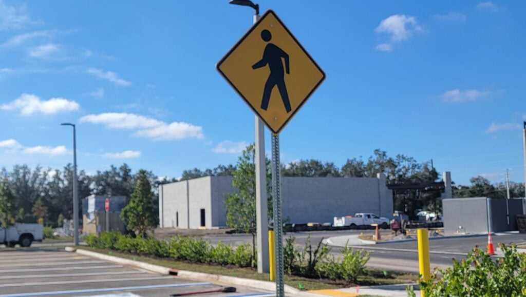 sign installation for Storage Facility parking lot