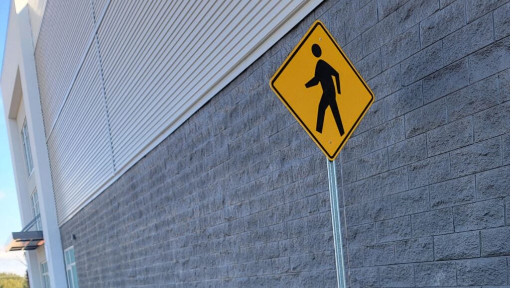 close-up of sign installed for Storage Facility parking lot