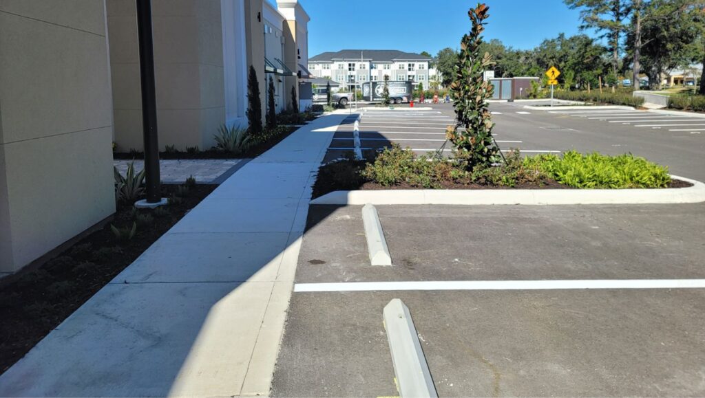 parking stops installed for The Hub parking lot