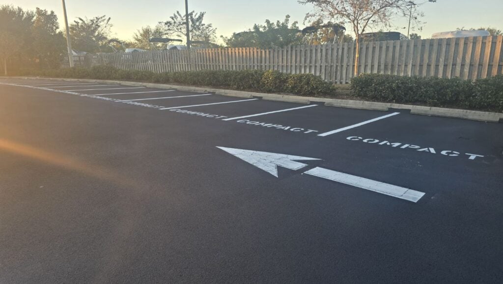 white arrows freshly painted for Apartment Complex