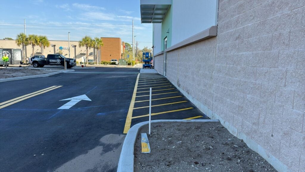 yellow line markings freshly painted for new business parking lot