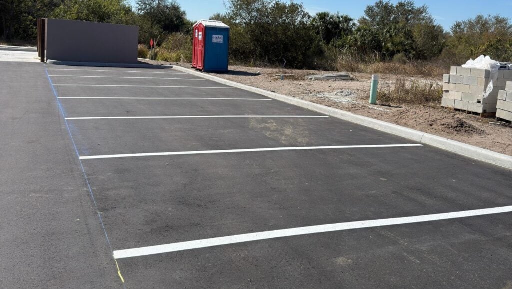 parking spots freshly painted for new business parking lot
