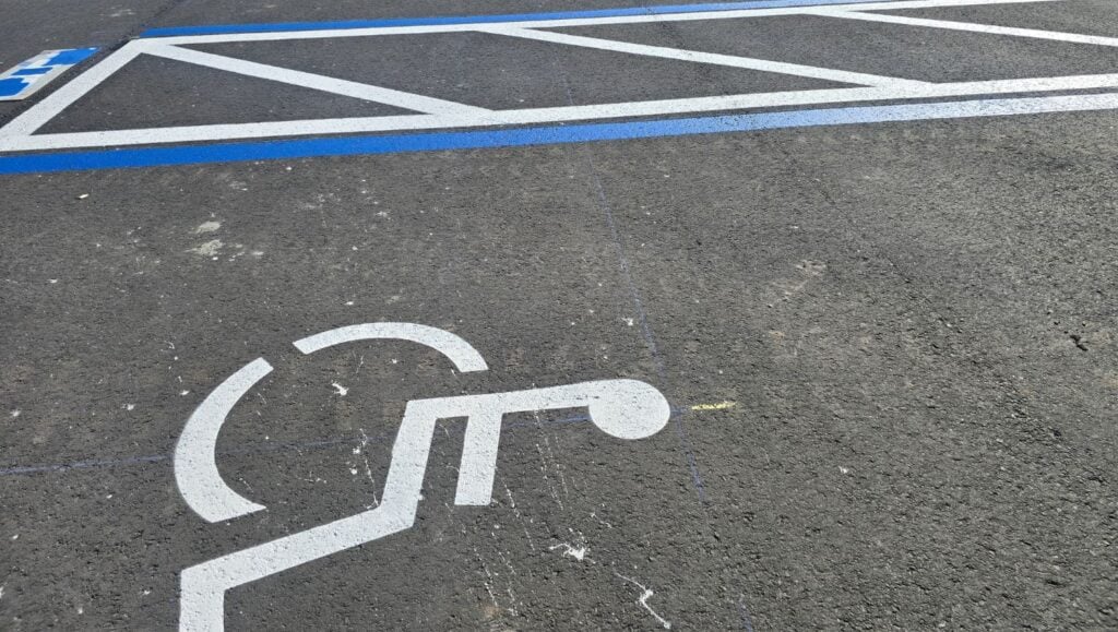 close-up of ada compliance parking spot freshly painted for Sports Complex