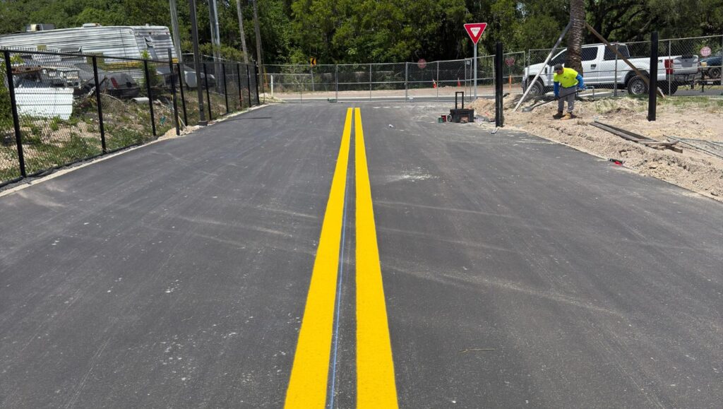 yellow line markings freshly painted for new business parking lot
