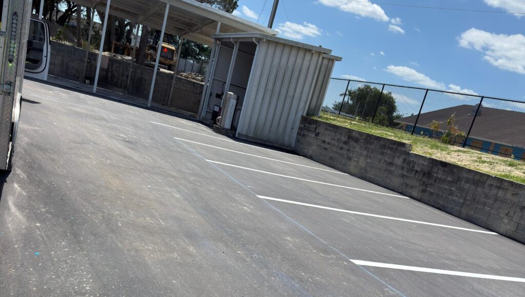 side view of parking spots freshly painted for new business