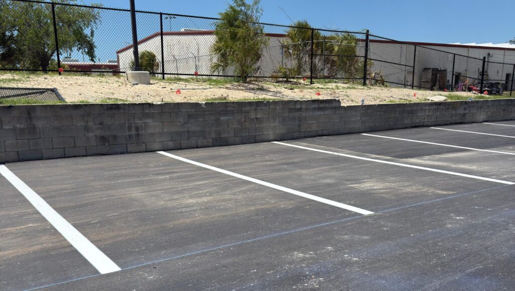 parking spots freshly painted for new business parking lot