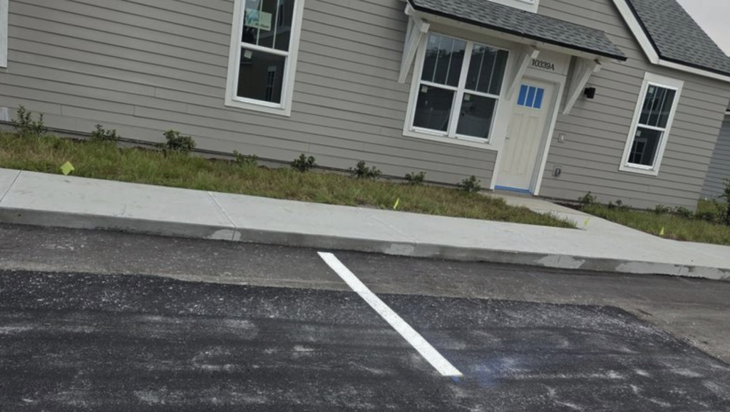 Apartment Community Service Line Striping in Wildwood, FL