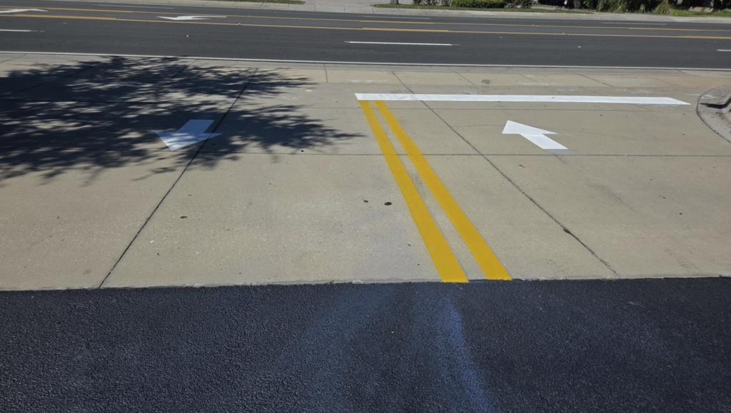 Line Striping Team Work for Ozark Bank in Bradenton, FL