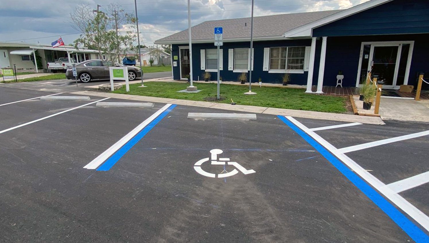a freshly striped ADA accessible stall at American Asphalt Paving in Winter Haven, FL