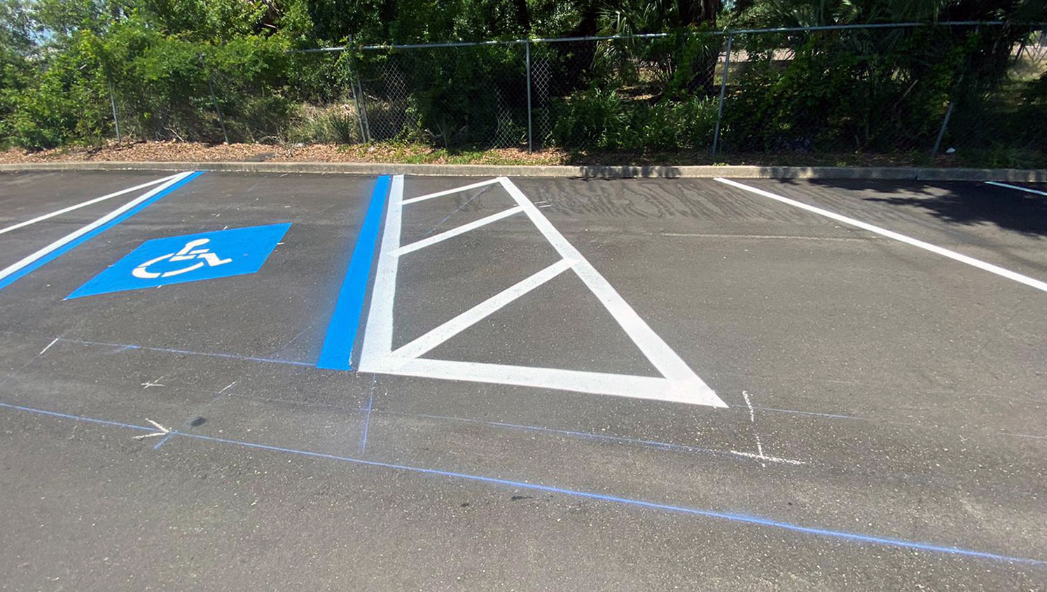 new ADA parking lot stalls striped for a car wash in Clearwater, FL